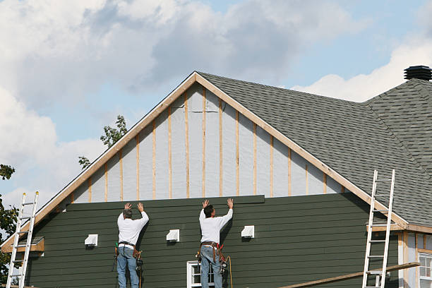 Professional Siding Installation technician working in Fairfax, VA